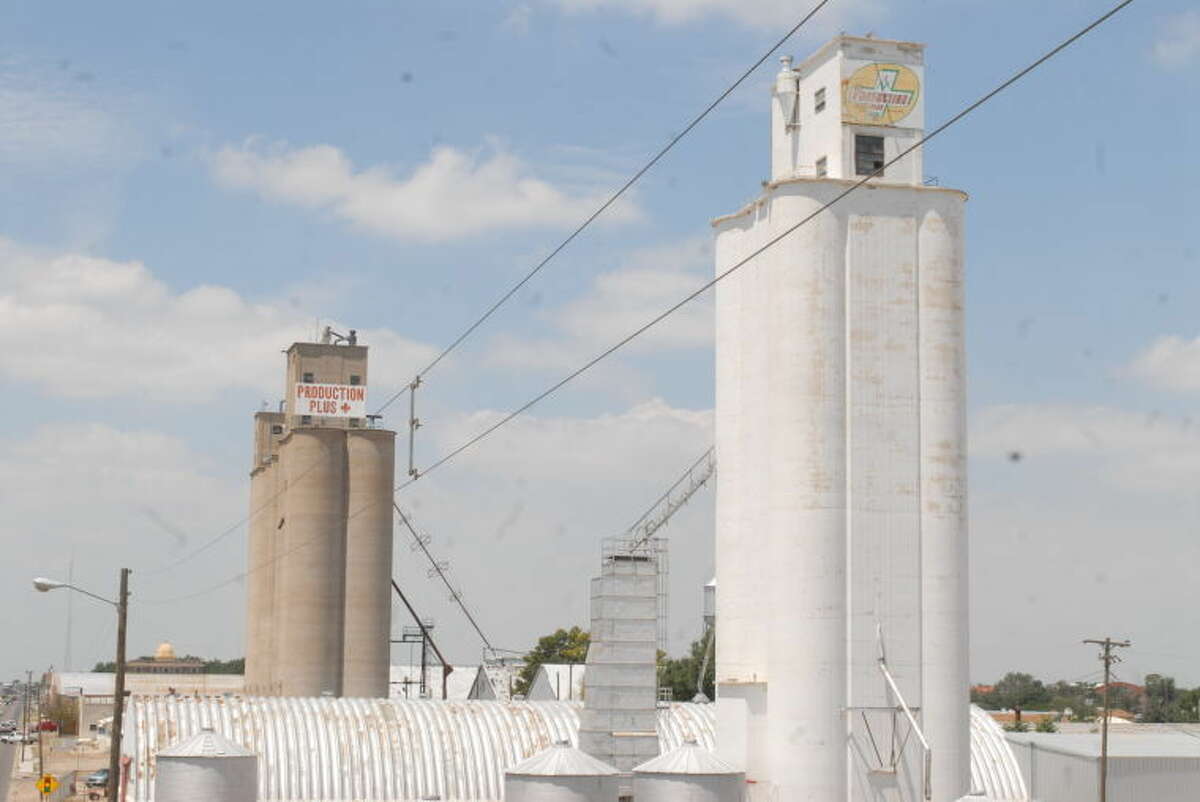Plainview's seed supplier Production Plus recently was purchased by New Deal seed operators Chromatin. Above, Productions Plus elevators are one of the first sights as eastbound drivers come into town from US 70.