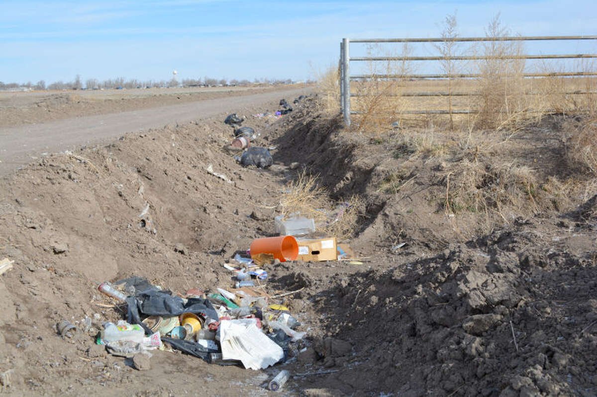 Trash dumped in bar ditch