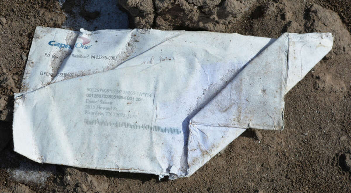 Trash dumped in bar ditch