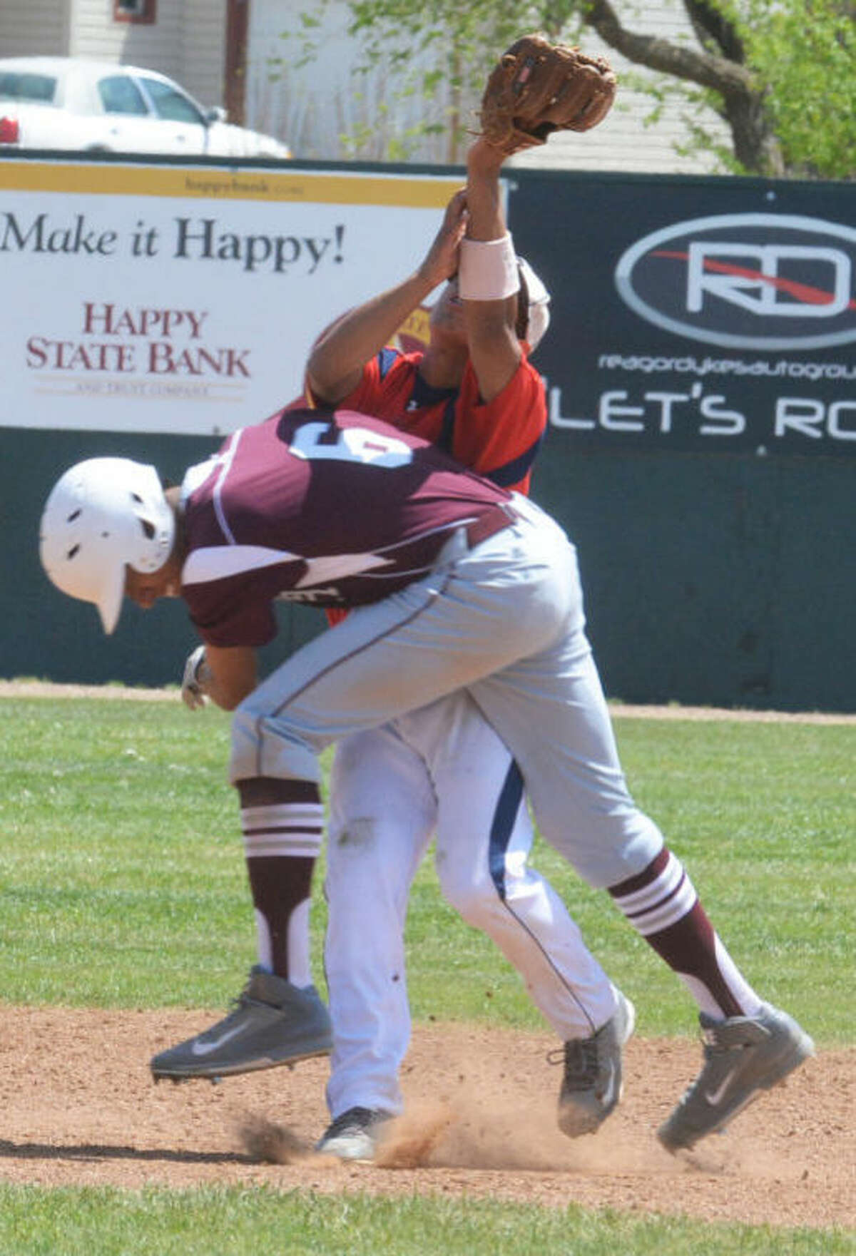 Hereford’s Payton Gonzales (6) runs into Plainview shortstop Danny Martinez as he tries to catch a popup in the sixth inning Friday. The ball dropped, but the runner was called out on the play for interfering with the fielder.