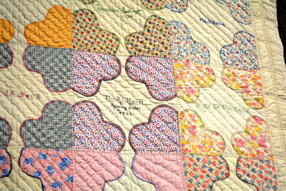 Looking Back Depressionera Friendship Quilt part of display at Unger
