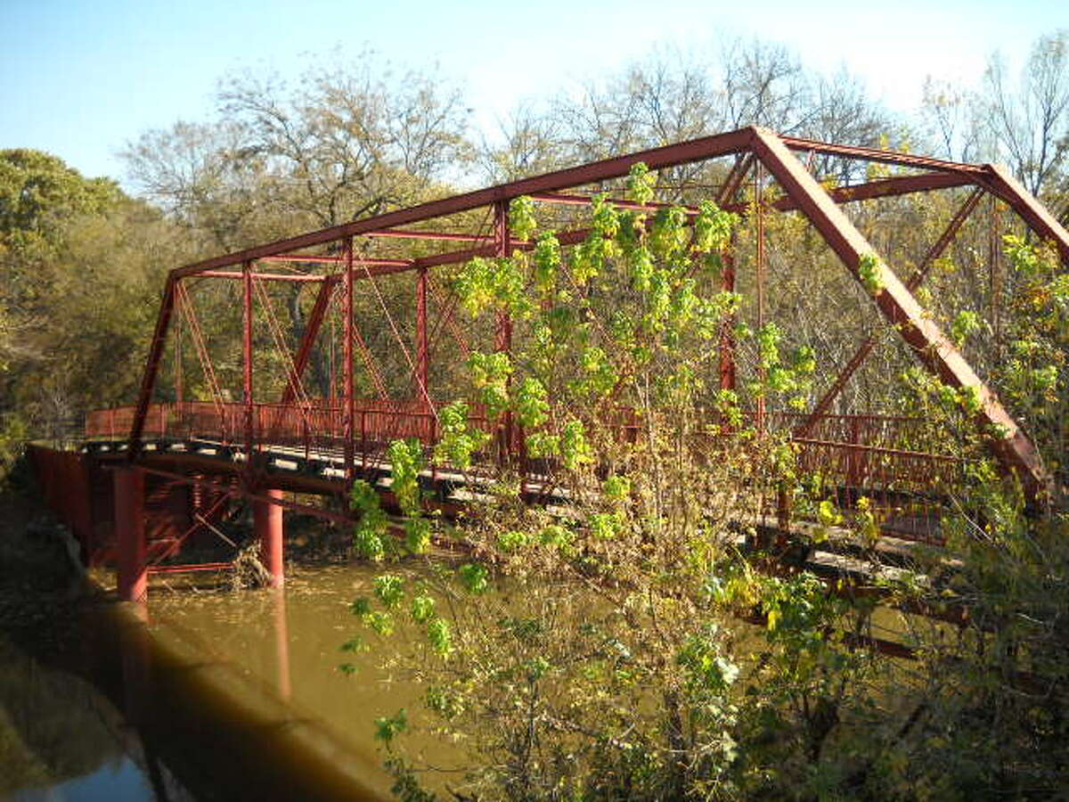 Old Alton Bridge, Denton This bridge is said to be haunted by the soul of a person who was hung from the bridge by Ku Klux Klan members. Photo by: Flickr/Ron