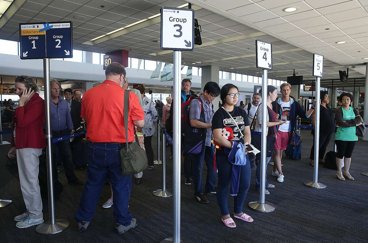 Passengers waiting for a flight out of SFO on a 787 United aircraft at on Tuesday, July 19, 2016, in South San Francisco, Calif. United airlines has added five international routes out of SFO airport since May.