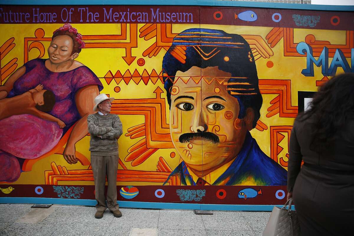 Michael Emmerson, manager forf flautist Elena Duran, waits keeps an eye out for Duran during the Dedication Ceremony & Cornerstone Presentation for The Mexican Museum on Tuesday, July 19, 2016 in San Francisco, California.