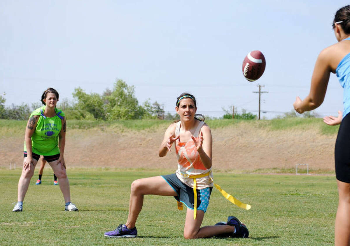 Courtesy PhotosBrunette player Rae Rousseau grabs the snap for teammate Nicole Steffe during a recent practice.
