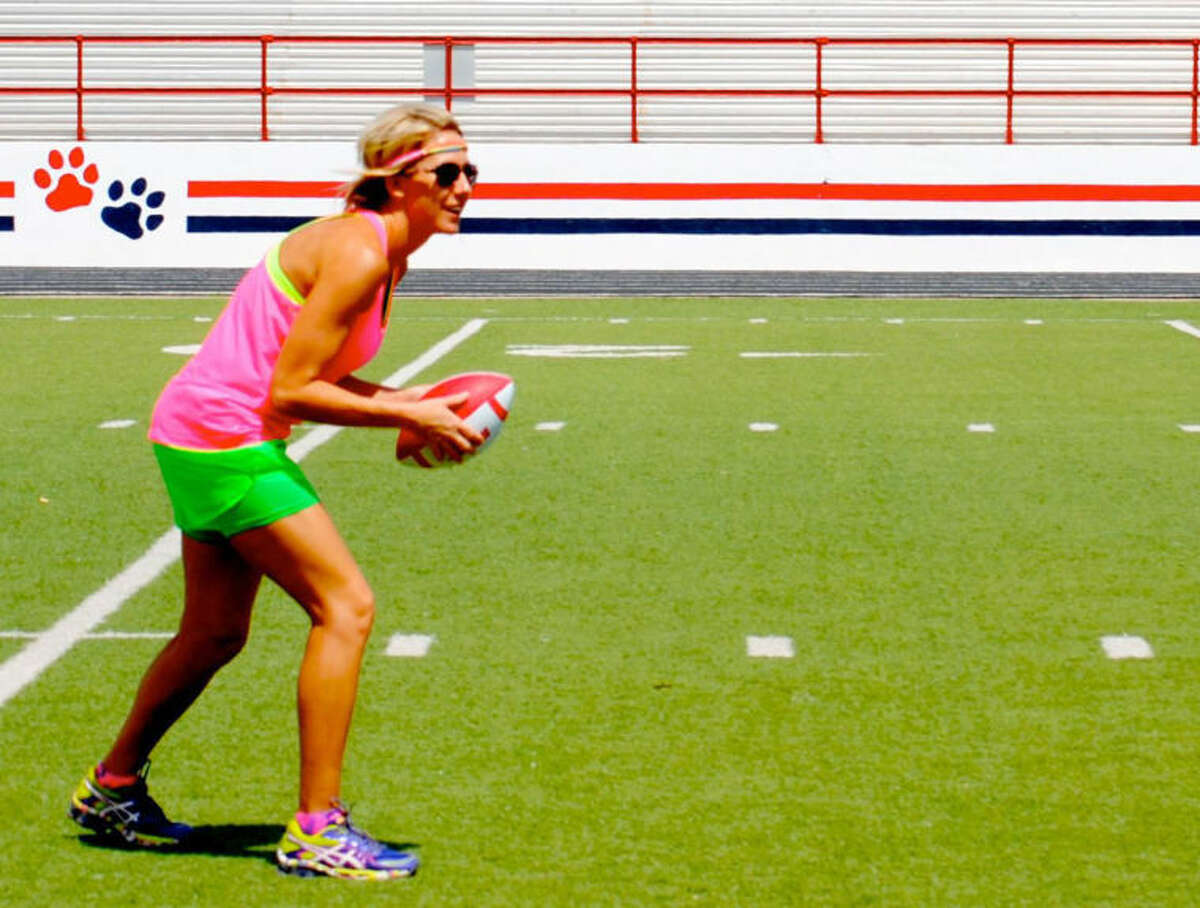 Blonde player Shay Webb gets ready to juke and dodge during a recent practice.