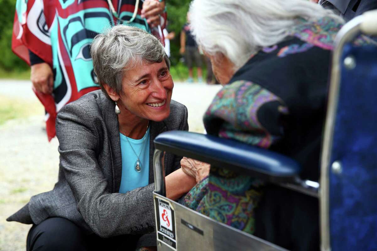 U.S. Interior Secretary Sally Jewell has worked closely with Native American groups in her three-year tenure.  Here, she greets Billy Frank Jr.'s older sister Maselle Bridges, 92, at a dedication ceremony for the newly named Billy Frank Jr. Nisqually National Wildlife Refuge, July 19, 2016.