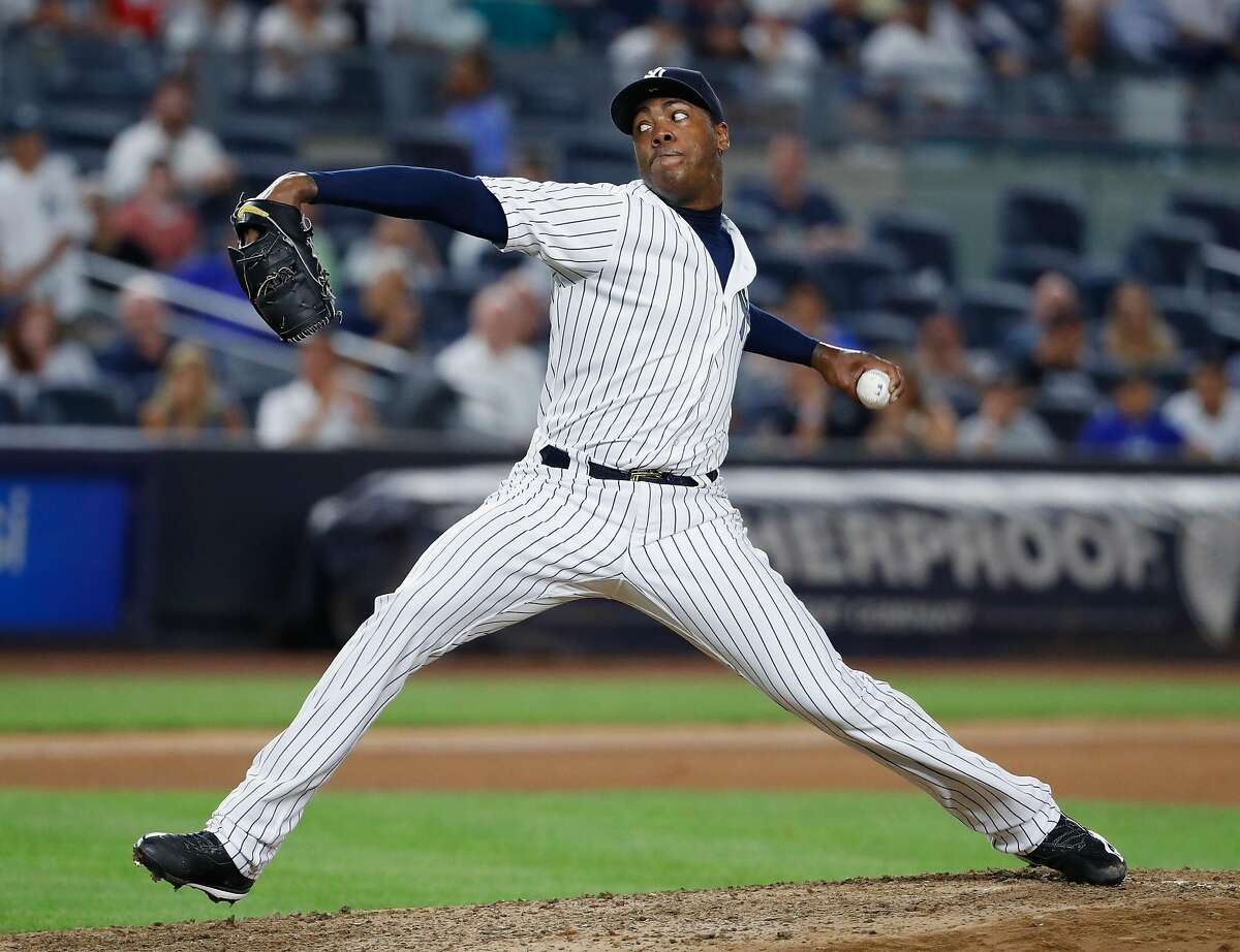 NEW YORK, NY - JULY 18: Aroldis Chapman #54 of the New York Yankees pitches against the Baltimore Orioles during their game at Yankee Stadium on July 18, 2016 in New York City. (Photo by Al Bello/Getty Images)