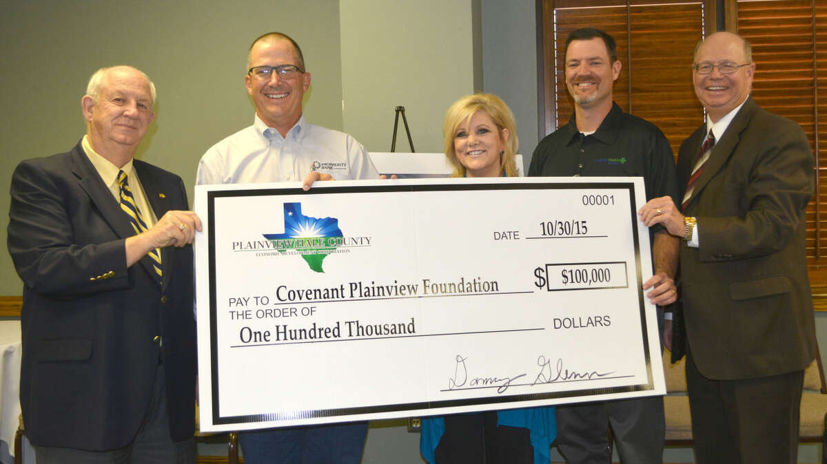 In recognition that a strong hospital is vital for industrial recruiting, Plainview-Hale County Economic Development Corp. at its quarterly board meeting Friday pledged $100,000 to the $40 million Covenant Health Plainview renovation and expansion. On hand for a ceremonial check presentation are David Wilder, left, drive chairman; David Glenn, PHCEDC president; Carol Terrell, Covenant Plainview Foundation coordinator; Clay Taylor, Covenant Plainview CEO; and Mike Fox, PHCEDC executive director.