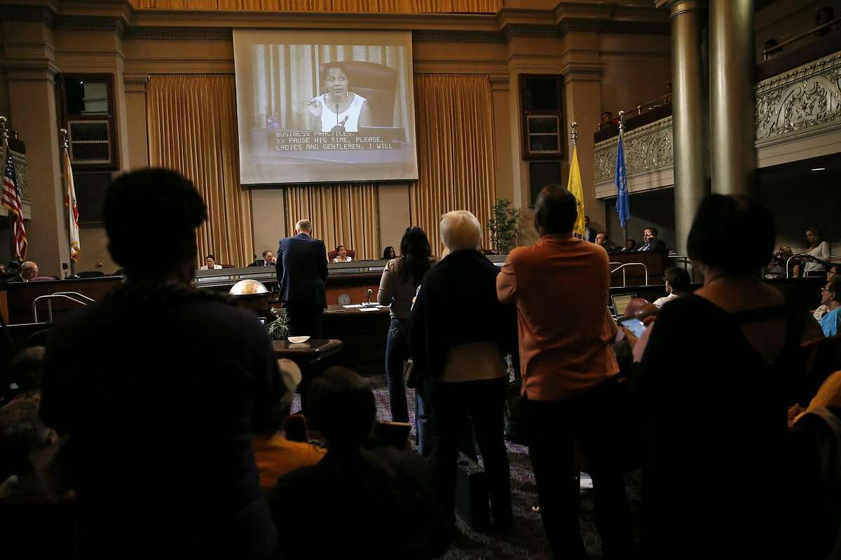 Oakland City Council President Lynette Gibson McElhaney asks the crowd to let an anti-rent control speaker talk during City Council meeting at City Hall in Oakland, Calif., on Tuesday, July 19, 2016.
