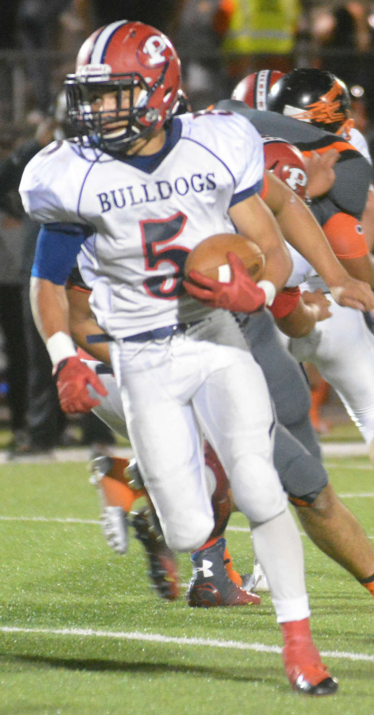 Plainview running back Warren Flye runs for yardage against Dumas last week. The senior leads District 4-5A in rushing and scoring as the teams head into the second half of the season.
