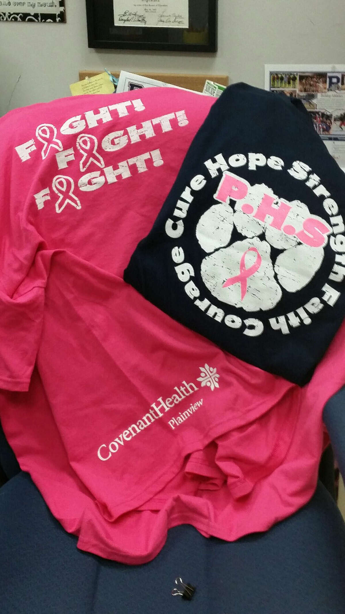 Gail Williams/Plainview HeraldPlainview High School varsity cheerleaders and Junior American Cancer Society are working to cover Bulldog Stadium in pink Friday night when the Bulldogs host the Hereford Whitefaces. Pink or navy T-shirts are available in youth/small to large and adult/small to 4X.