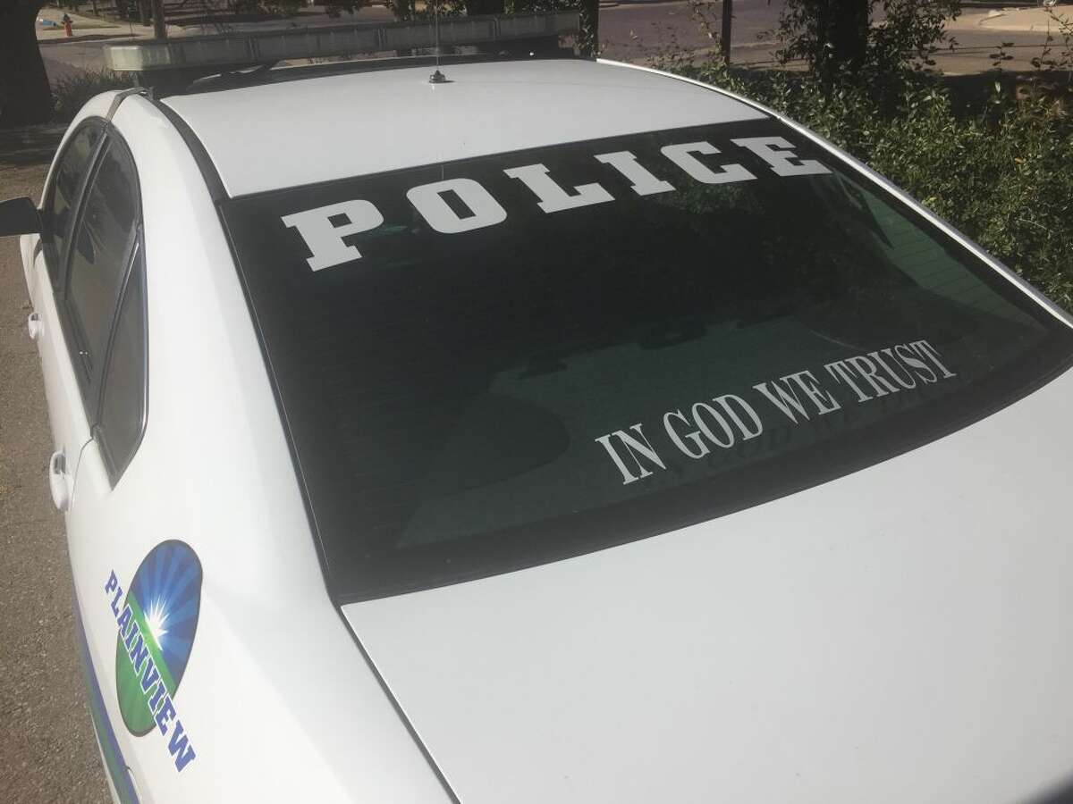 In God We Trust now on Plainview PD vehicles