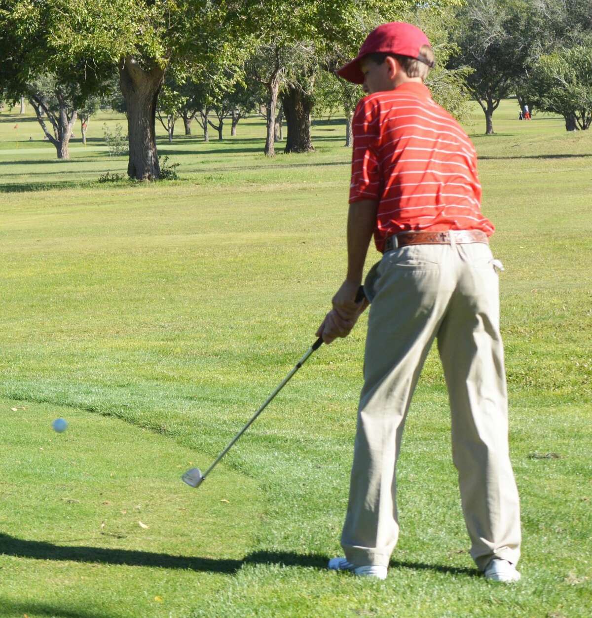 Plainview's Hagen Offield chips the ball onto the green during the Plainview Triangular at the Plainview Country Club Saturday. Offield shot a 99 to help the 'B' team to a second-place finish in their meet against Hereford and Pampa.