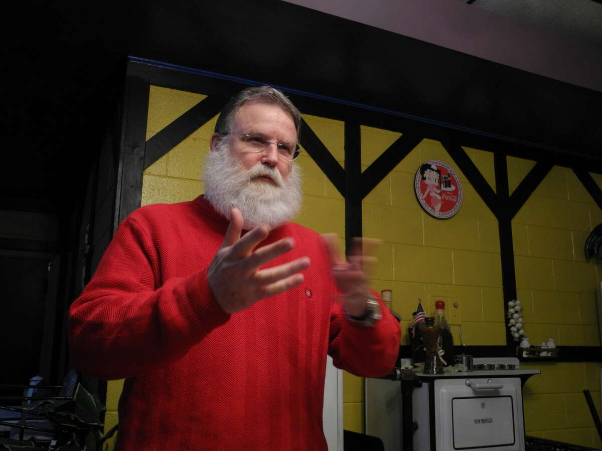 With his bushy beard and red sweater, Rodney Watson is often mistaken for Santa Claus even when he’s not wearing his red suit. Watson reminisced about his 16 years in the role of Santa at the annual Hi-Plains Genealogy Society & Hale County Historical Commission joint meeting at Old Mexico last week.