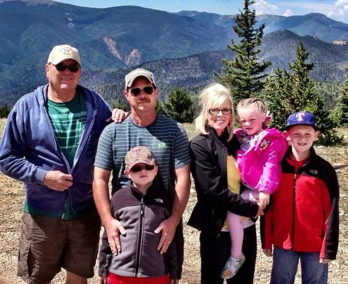 Farming since he was 7, Cody Gruhlkey (second from left) knew what he wanted to do as a kid as he longed for the farmland of the Plains. Gruhlkey is joined by father Perry Gruhlkey, Austin, wife Heather, Laney and Brennan.