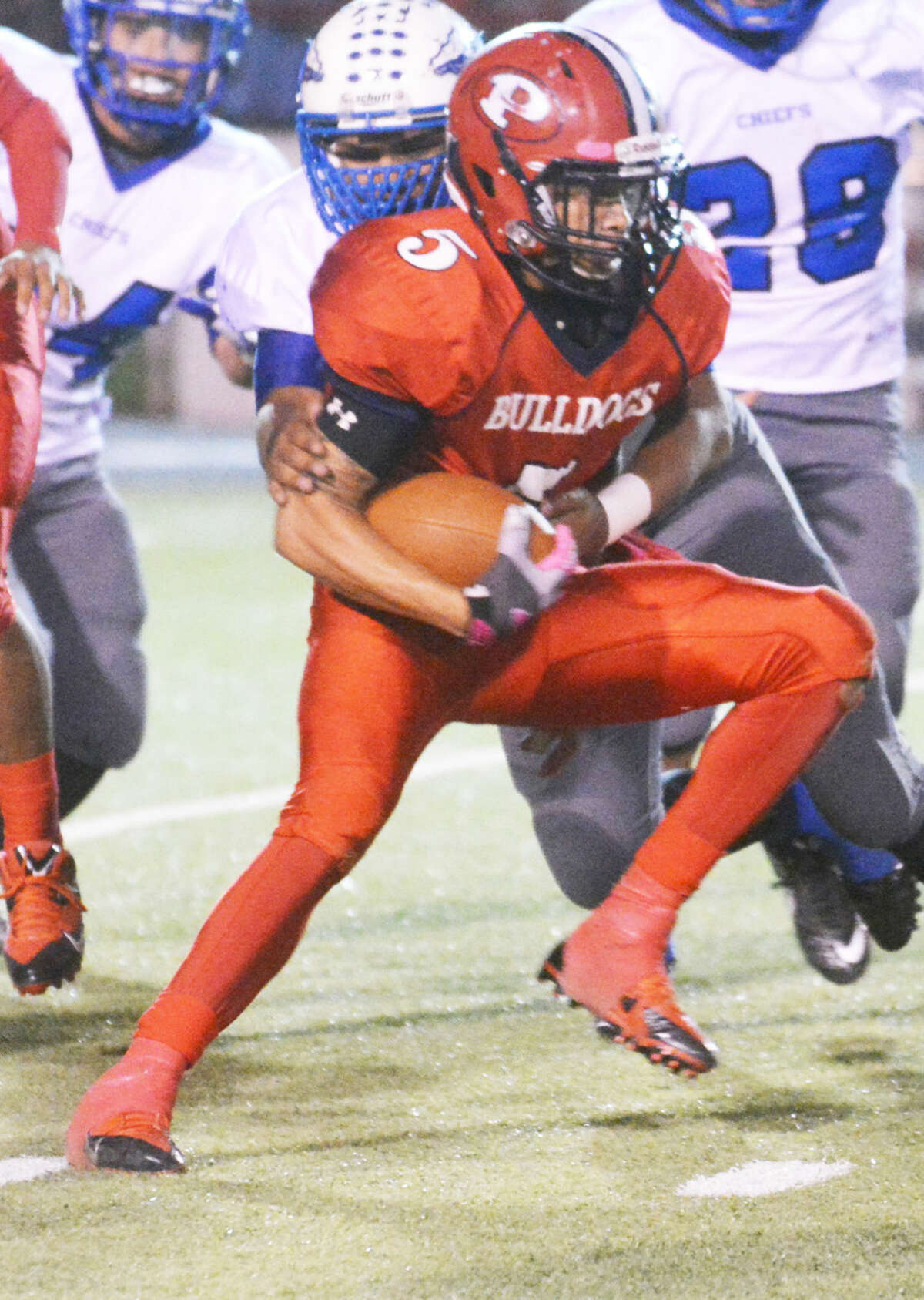 Plainview running back Warren Flye darts for yardage against San Angelo Lake View Friday night. The speedy senior set a Plainview school record with 504 yards rushing in the game. He broke the previous record of 466 yards set by Jamar Wall in 2005.