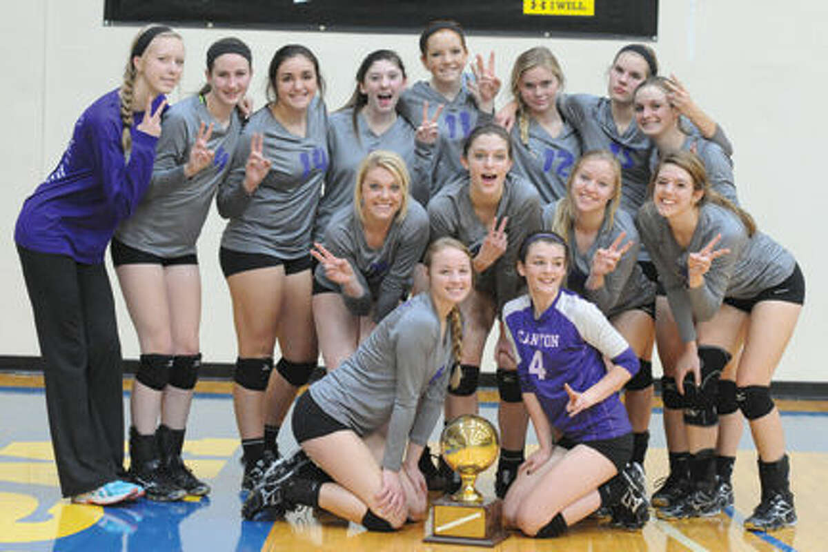Canyon’s Lady Eagles celebrate their bi-district win over Lubbock High Tuesday night. Photo by LISA HUGHES