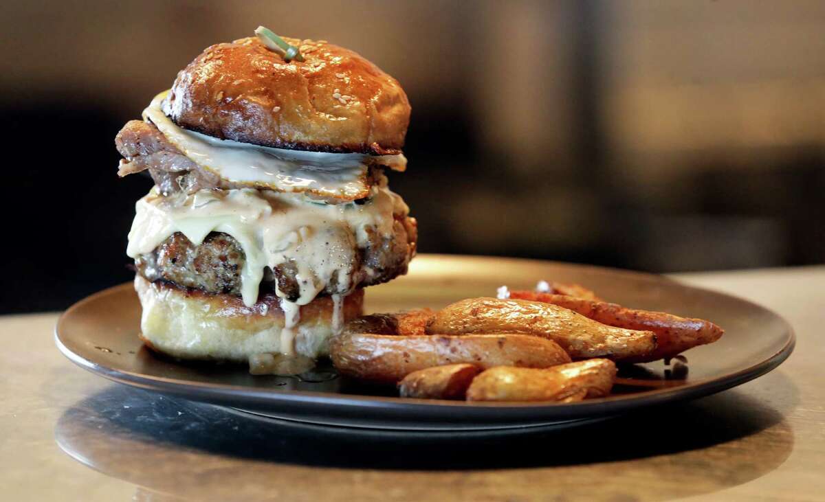 Folc's brisket burger with pork belly and a fried egg was named the best burger in Texas by Texas Monthly magazine.