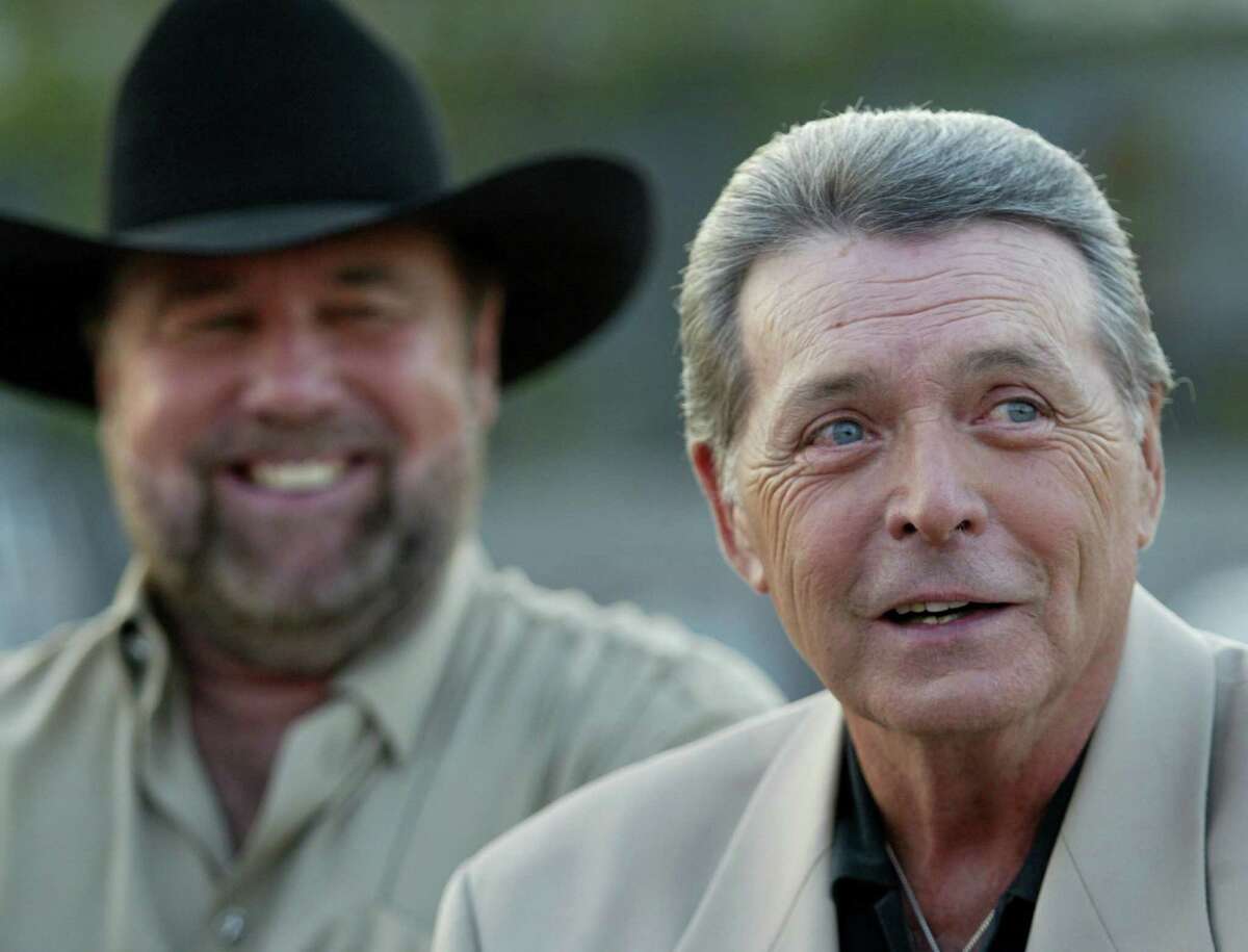 After the release of "Urban Cowboy" in 1980, the careers of Johnny Lee, left, and Mickey Gilley went into overdrive. Both would go on to hit the country charts on a regular basis during the next decade.