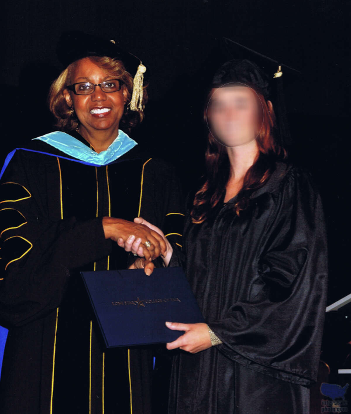 The rape victim, pictured on the right during a graduation ceremony, is suing Harris County and the county's law enforcement agencies. Her face has been blurred in this photo to protect her identity.