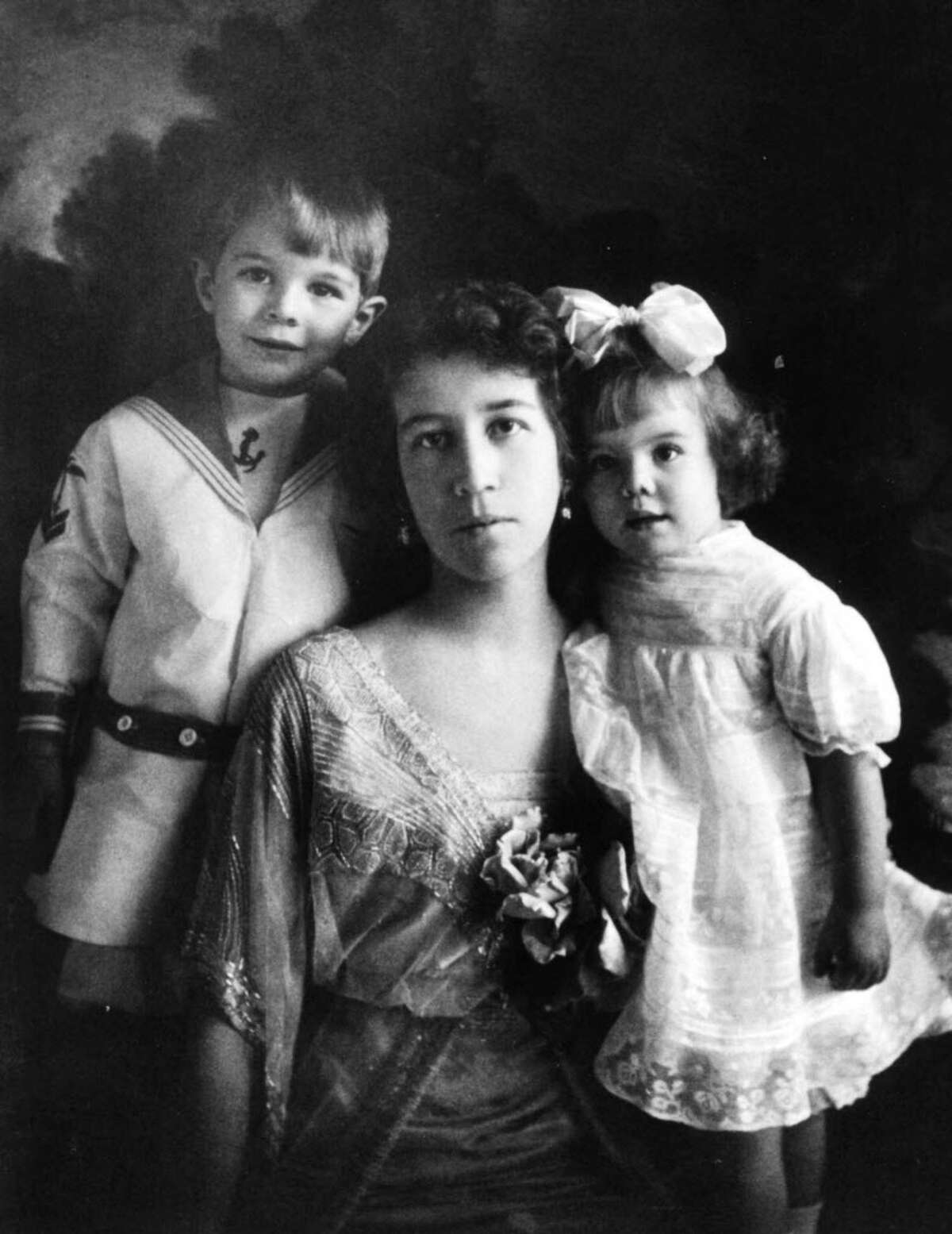 We dug through the Times Union photo archives to bring you this lookbook of Albany fashion in the 1900s. See how it has changed through the decades.  -- A 1915, photograph of Louise Maxwell Corning with her son Erastus 2nd, and daughter Louise, taken in Albany.