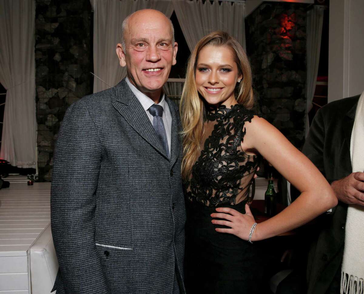 John Malkovich and Teresa Palmer attend the after party for the LA Premiere of "Warm Bodies" at the ArcLight Cinerama Dome on Tuesday, Jan. 29, 2013 in Los Angeles, California. (Photo by Todd Williamson/Invision for The Hollywood Reporter/AP Images)