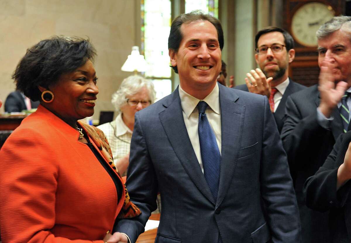 New York State Senator Andrea Stewart-Cousins, left, shakes hands with Todd Kaminsky after she swore him in as a state senator at the Capitol on Tuesday, May 3, 2016 in Albany N.Y. Kaminsky, an assemblyman who won the special election in the 9th Senate District last month will take the seat of disgraced former senator Dean Skelos. (Lori Van Buren / Times Union)