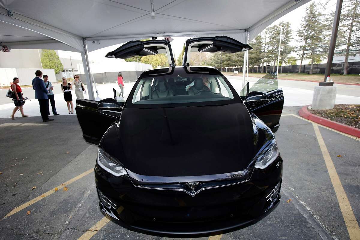 The Tesla Model X car is introduced at the company's headquarters Tuesday, Sept. 29, 2015, in Fremont, Calif. Tesla's Model X � one of the only all-electric SUVs on the market � was officially unveiled Tuesday night near the company's California factory. (AP Photo/Marcio Jose Sanchez)