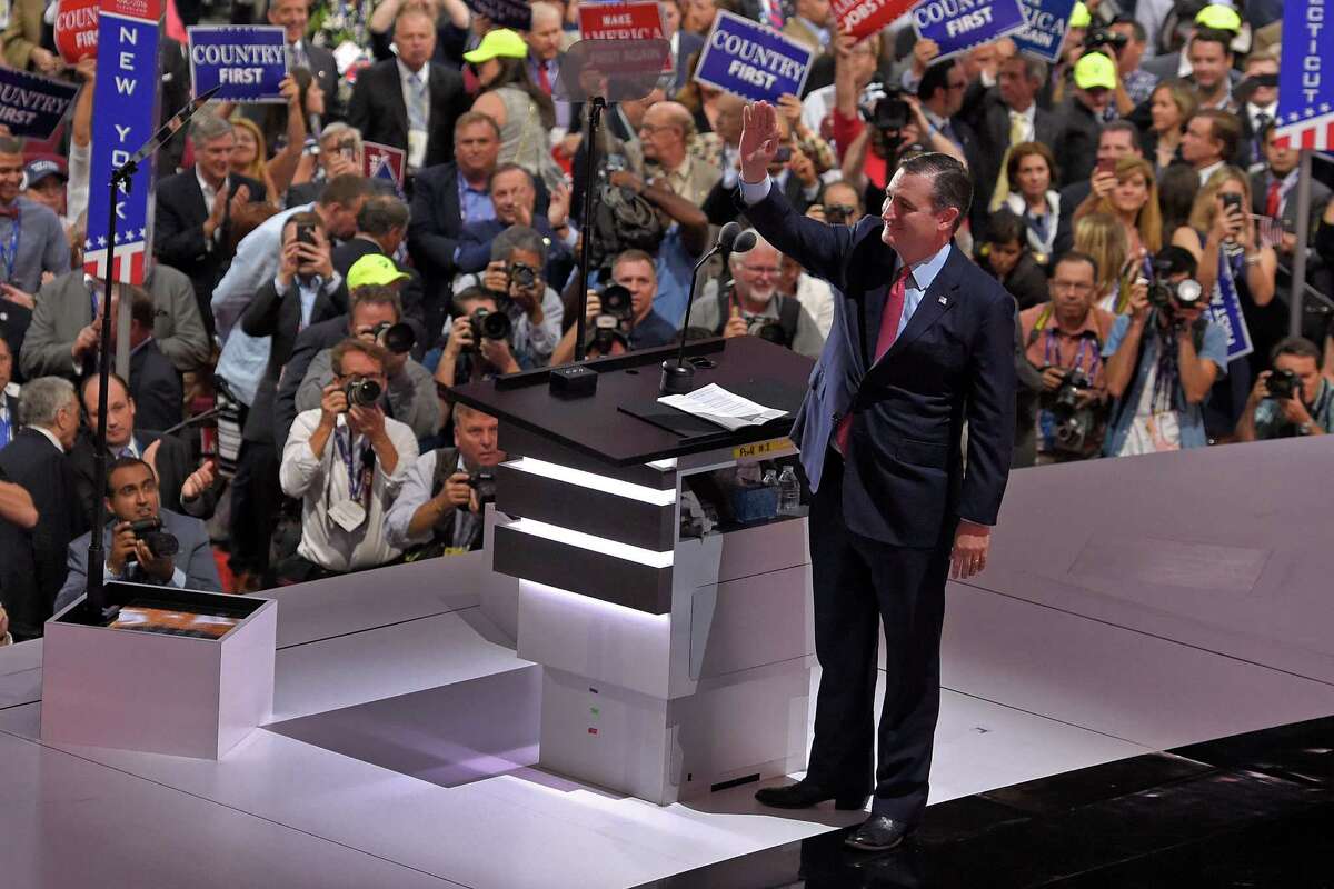 Sen. Ted Cruz, R-Tex., waves as he steps to the podium during the third day of the Republican National Convention in Cleveland, Wednesday, July 20, 2016.