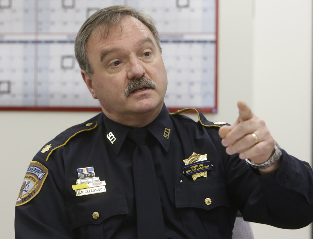 Deputy constable killed in ambush mourned as 'cop's cop'