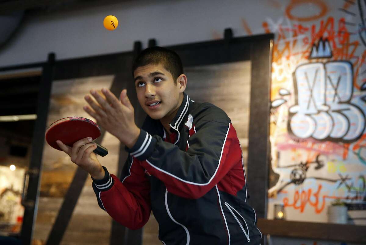 Kanak Jha, a 16-year-old table tennis phenom from Milpitas who is the first Millennial, born in 2000, to qualify for the Olympic Games takes part in Friends with Paddles fundraiser event to benefit 2016 U.S. Olympic Table Tennis Team at Spin in San Francisco, Calif., on Thursday, July 21, 2016.