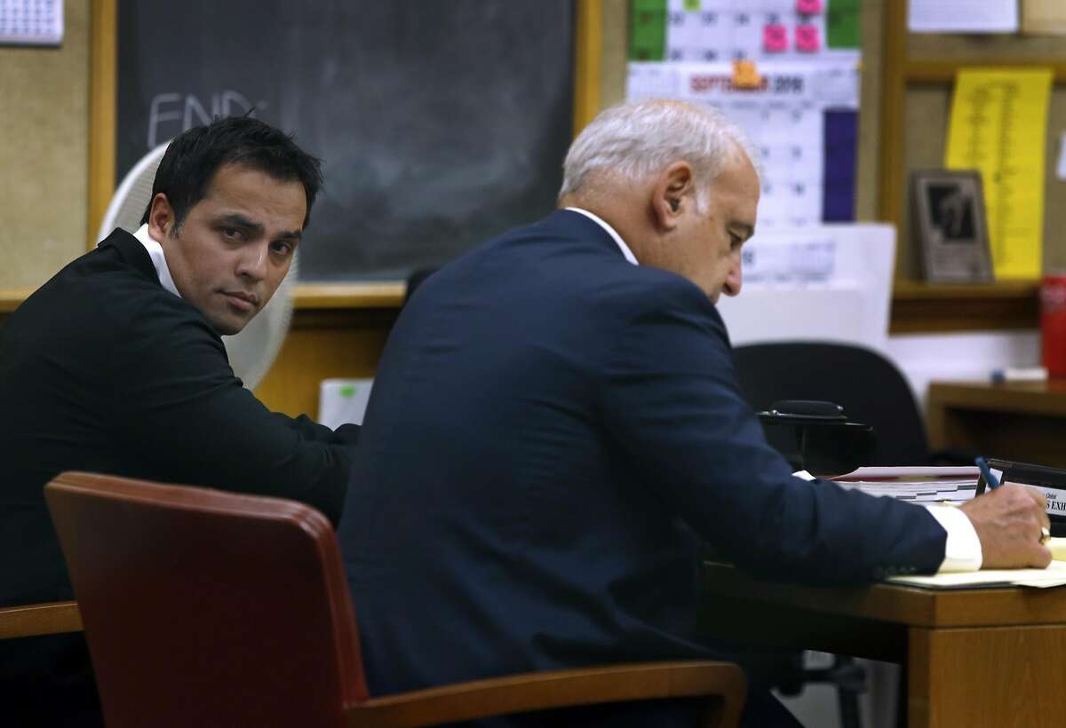 Tech mogul Gurbaksh Chahal sits with his attorney James Lassart during a hearing to consider revocation of his probation on domestic violence charges in San Francisco, Calif. on Friday, July 22, 2016.