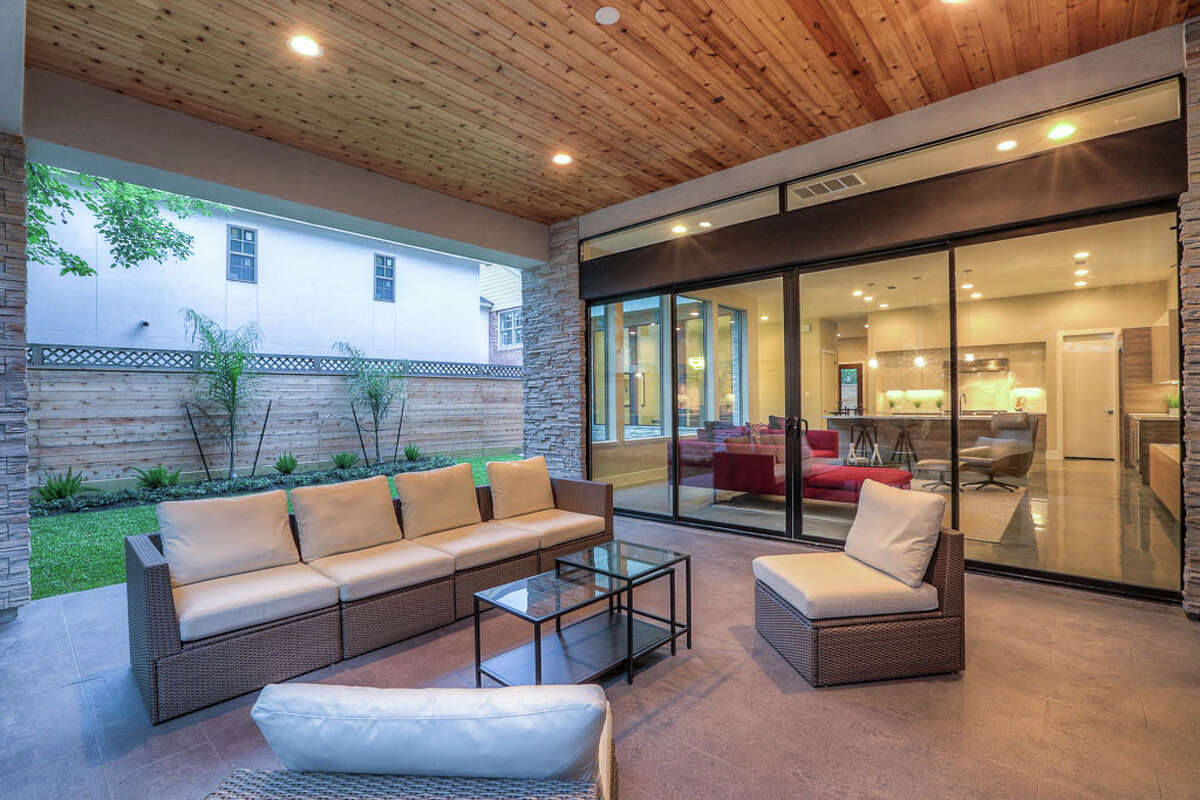 Blending indoor and outdoor spaces is part of the design in this home by On Point Custom Homes.