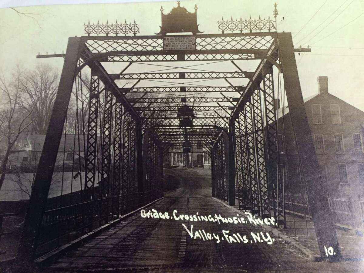 An undated photo of a bridge over the Hoosic River, showing the Thompson Mill on the right in Valley Falls. (courtsey Village of Valley Falls)