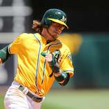 A’s Josh Reddick out with back issue - SFGate