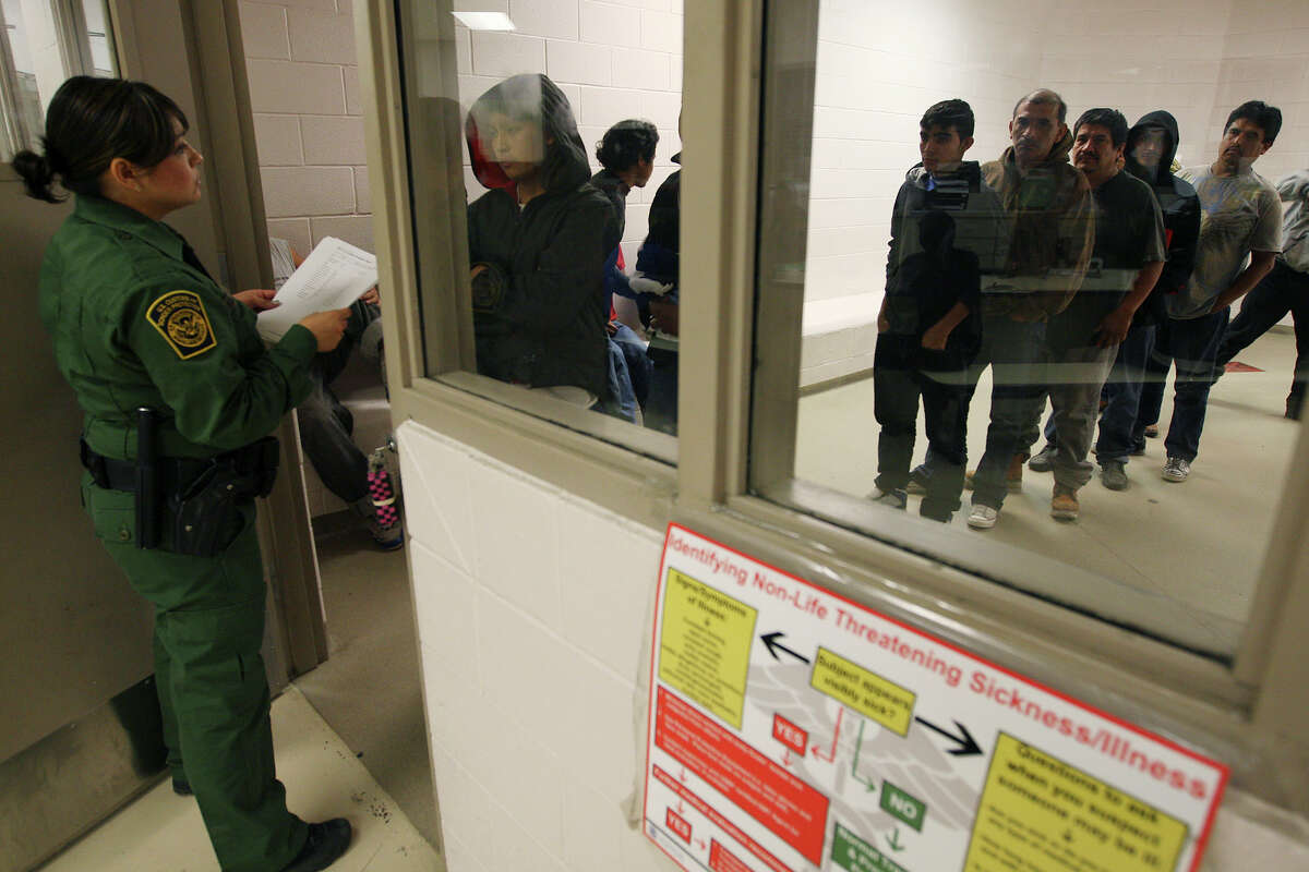 U.S Border Patrol Agent Mari Ramirez lines up immigrants for roll call at the Falfurrias, Texas station, Wednesday, December 19, 2012. The latest U.S. Border Patrol apprehensions data for June of 2016 shows a slight dip in the total number of undocumented immigrants caught entering the country illegally, however, families and unaccompanied children continue turning up at the border remain high. In fact, shelters in Mexico and in McAllen say in recent weeks the numbers have spiked, even as immigration officials reaffirm their commitment to cracking down on smuggling organizations.