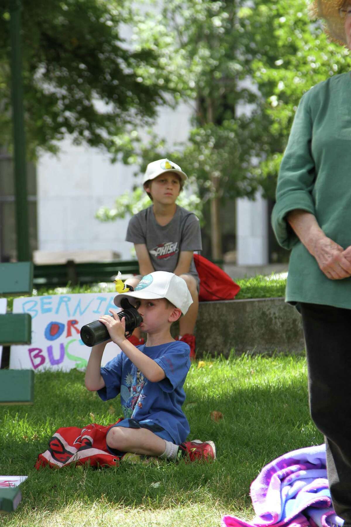 Koby Ross, 7, and his brother Ari, 11, rest during a rally in Albany for Bernie Sanders Sunday, July 24. The Ross family, from Monroe, N.Y., drove two hours for the rally. (Photos: J.p Lawrence).