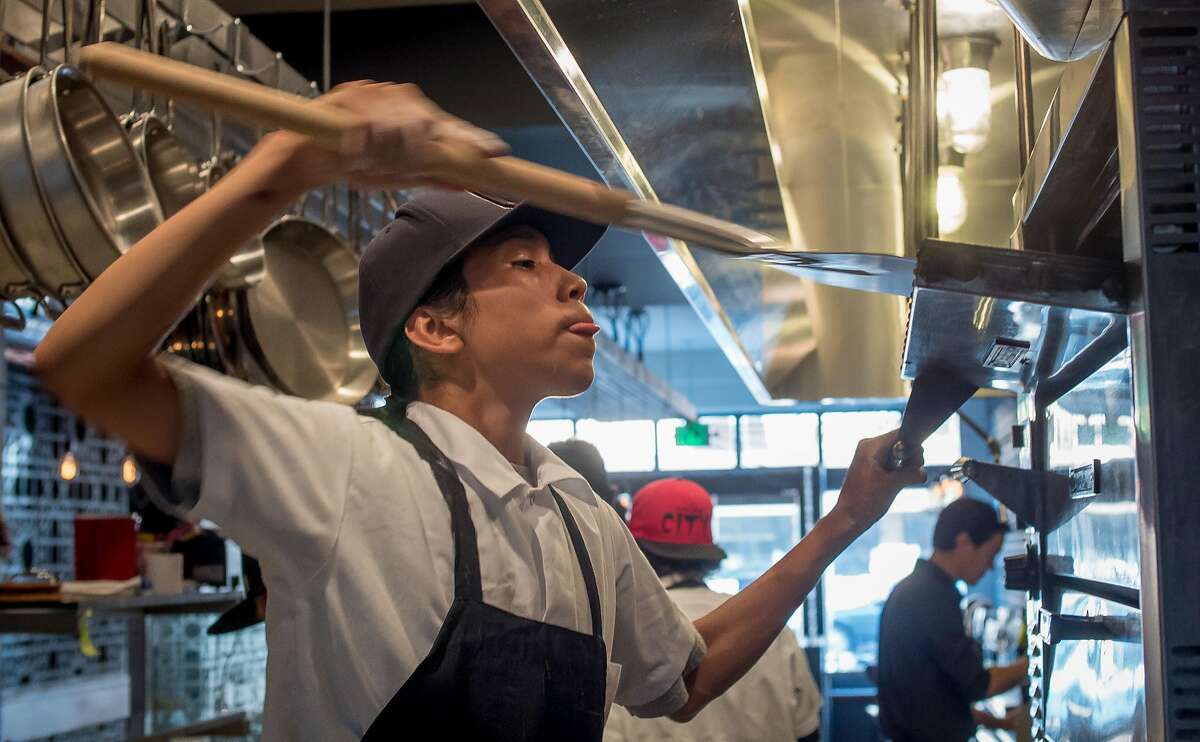 Carlos Hernandez makes bread at Tawla in San Francisco, Calif. on July 24th, 2016.