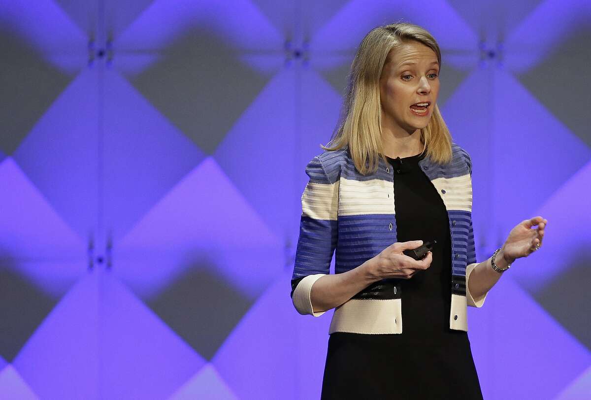FILE - In this Feb. 18, 2016, file photo, Yahoo CEO Marissa Mayer delivers the keynote address at the Yahoo Mobile Developer Conference in San Francisco. Yahoo reported Tuesday, April 19, 2016, that after subtracting ad commissions, Yahoo's revenue fell 18 percent from the same time a year earlier, to $859 million. It's the largest decline in Yahoo's quarterly net revenue since the company hired Mayer as its CEO nearly four years ago. (AP Photo/Eric Risberg, File)