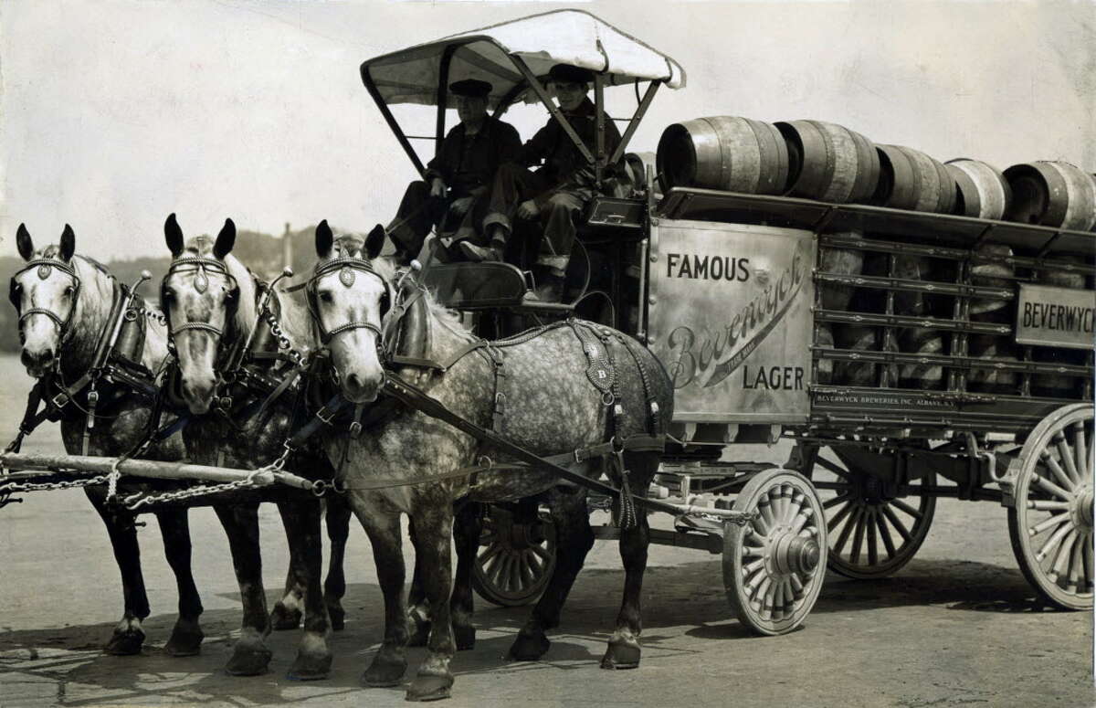 Beverwyck Lager beer wagon 3 horse hitch July 17, 1933, in Albany, N.Y. The brewery reopened in 1933 with the launch of a new lager. They also used trucks for delivery - something new for the new beer. The stables held 40 horses in 1884. (Times Union archive)