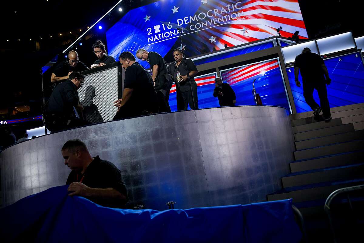 Final preparations underway on stage for the Democratic National Convention, at the Wells Fargo Center in Philadelphia, July 25, 2016. (Eric Thayer/The New York Times)
