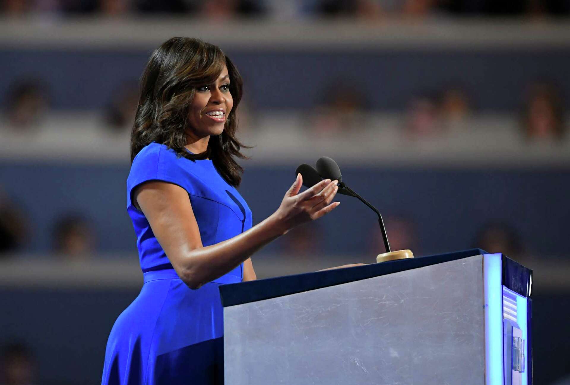 who designed michelle obama's dnc dress Michelle Obama Praised for Wearing Her Hair in Braids at the 2024 DNC