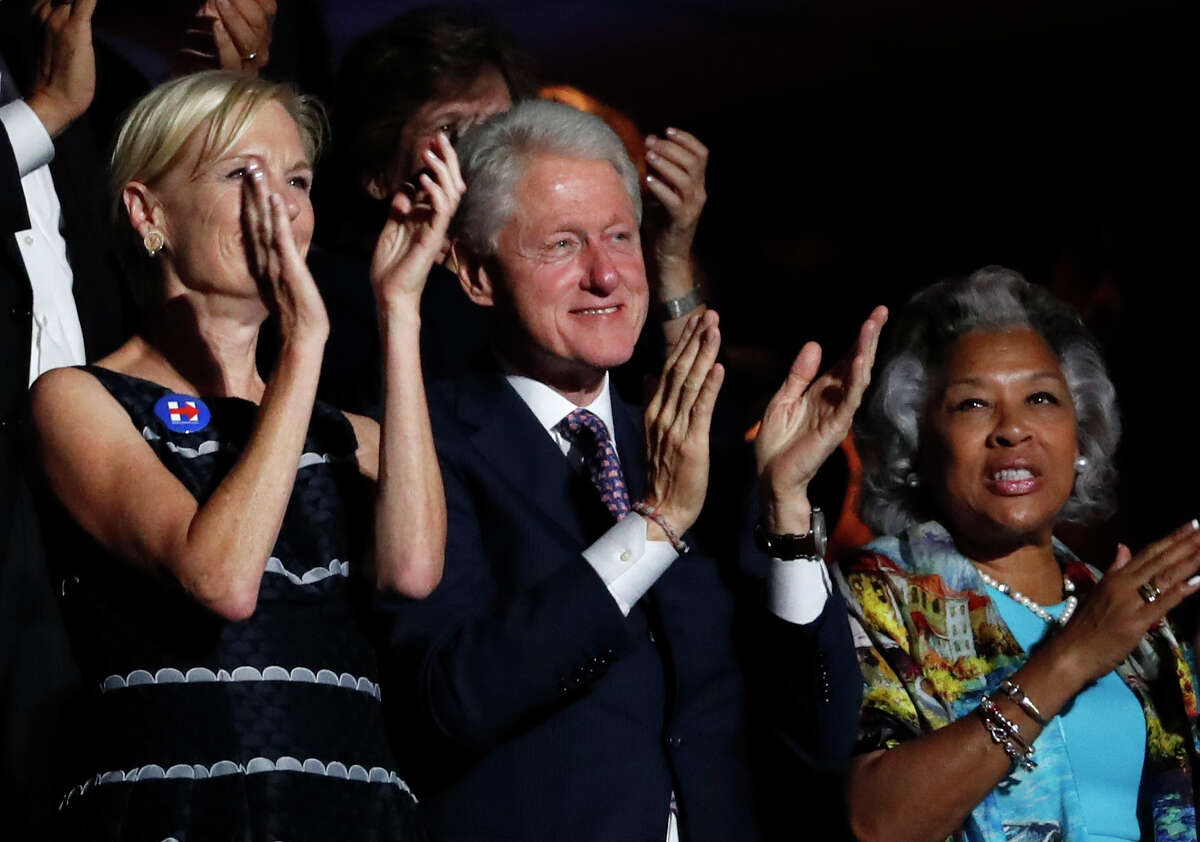 Former President Bill Clinton applauds Former Democratic Presidential candidate, Sen. Bernie Sanders, I-Vt., as he speaks during the first day of the Democratic National Convention in Philadelphia , Monday, July 25, 2016.