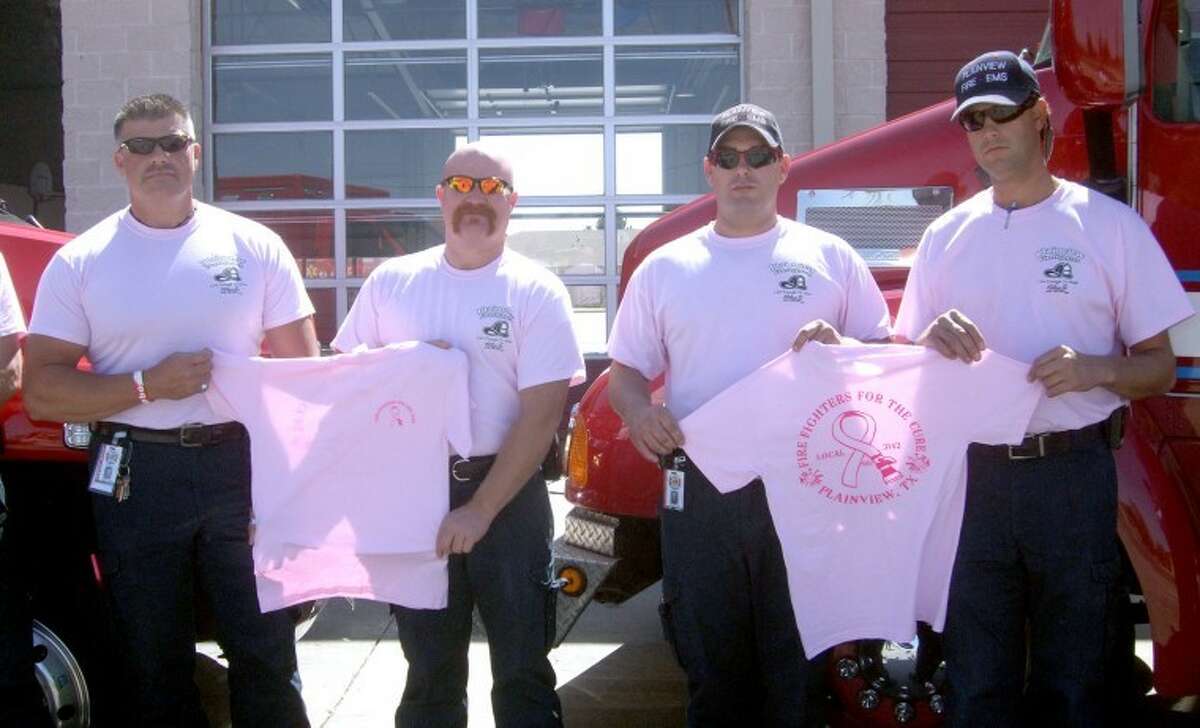 Members of the Plainview Fire Department and EMS — including Lt. Bobby Gibson (left), Bryan Merrick, Joe Marks and Carson Johnson — will be wearing pink T-shirts through October in recognition of Breast Cancer Awareness Month. T-shirts are available at Station #3, 3405 S.W. Third, for $10. Proceeds go to the Susan G. Komen Foundation. 