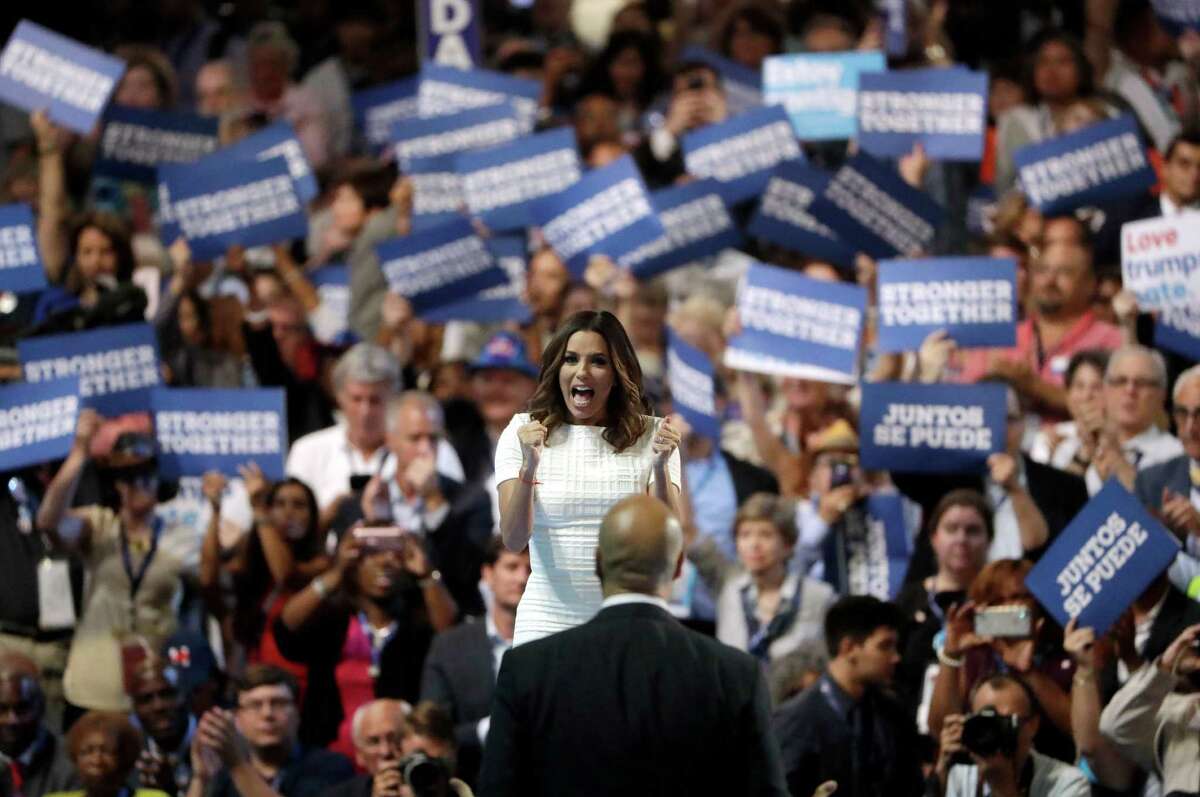 Actress Eva Longoria introduces Sen. Cory Booker, D-NJ., during the first day of the Democratic National Convention in Philadelphia , Monday, July 25, 2016. (AP Photo/Matt Rourke)