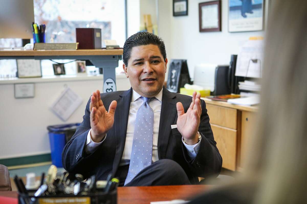 San Francisco's superintendent, Richard Carranza has a meeting with colleague Danielle Houck (right) in his office in San Francisco, California on Monday, January 4, 2016.