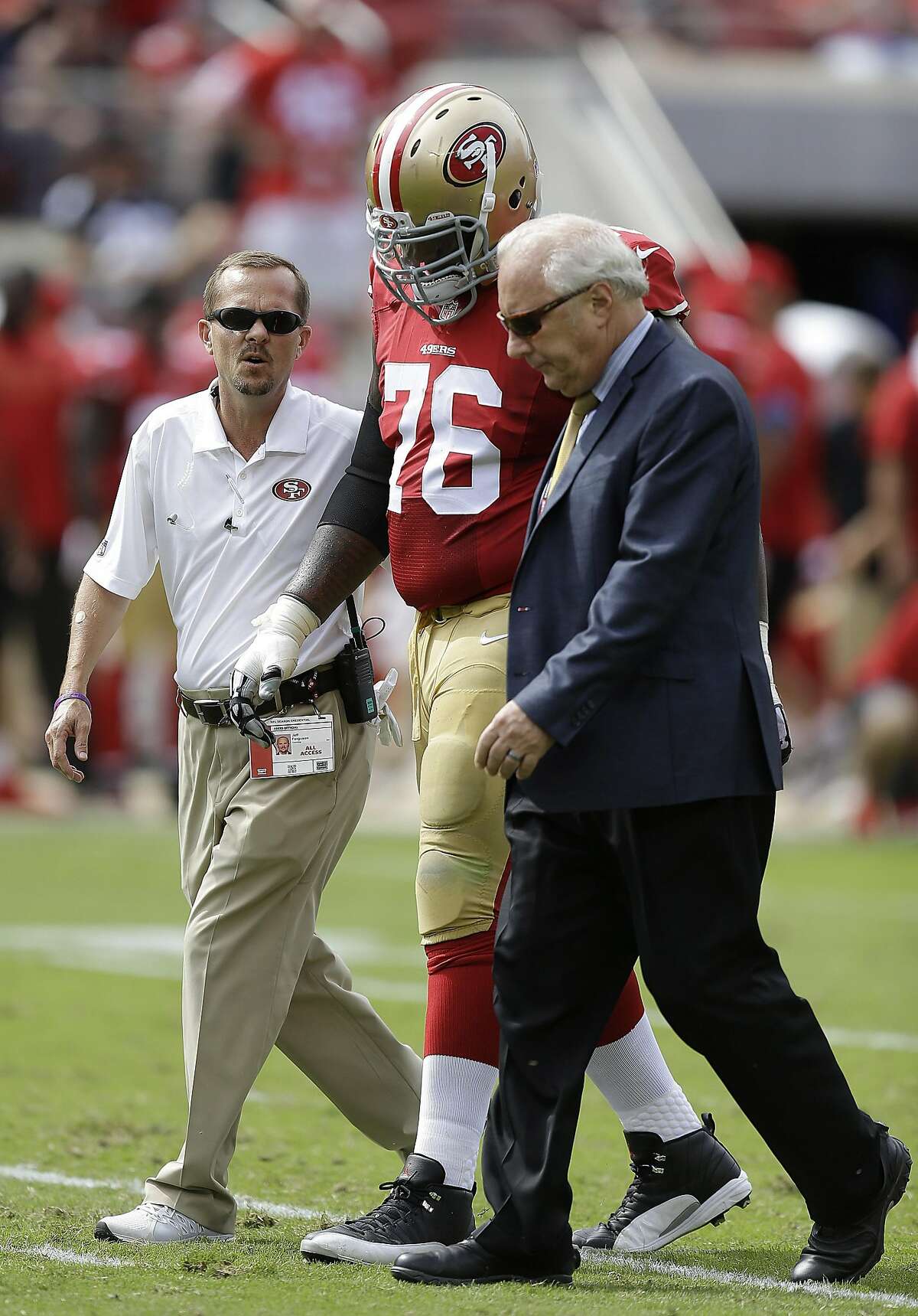 San Francisco 49ers offensive tackle Anthony Davis (76) walks off the field after being injured against the Philadelphia Eagles during the first half of an NFL football game in Santa Clara, Calif., Sunday, Sept. 28, 2014. (AP Photo/Ben Margot)