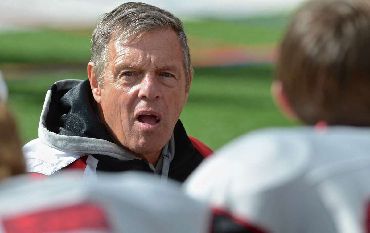 New Canaan head coach Lou Marinelli talks to his players during a recent game against Danbury.