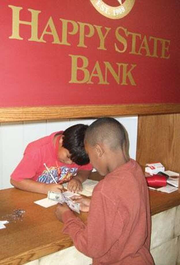 Happy State Bank opens Kids' Bank at College Hill Plainview Daily Herald